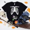 Halloween Pregnancy Announcement With Skeleton Heart Shirt